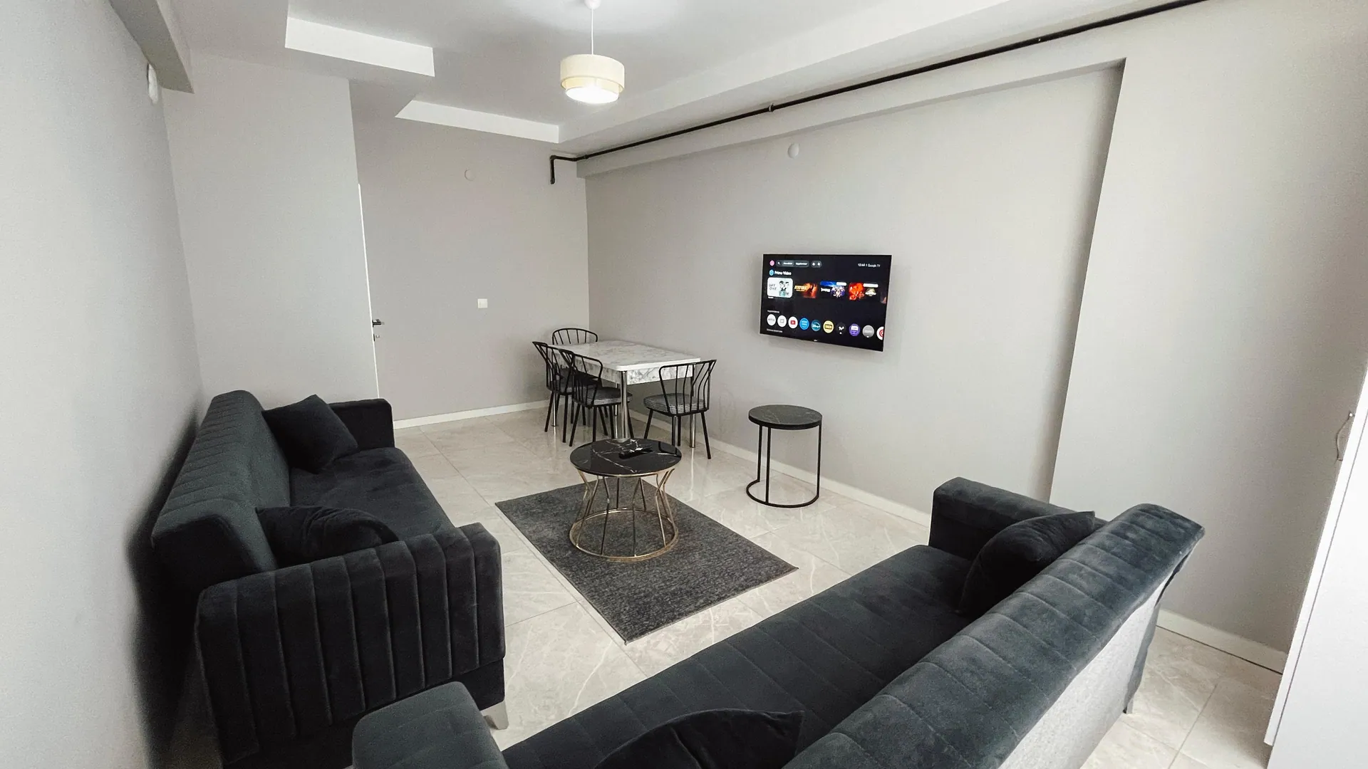 Wide view of the deluxe apartment living room